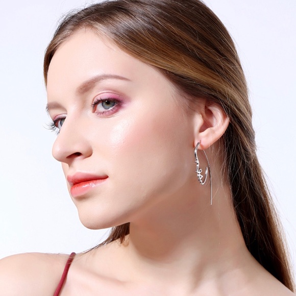 Silver Hollow Face Design Earrings - Picture 3 of 6